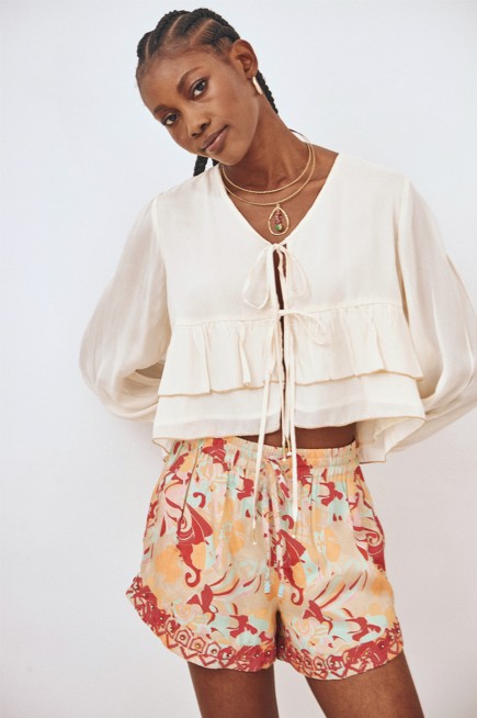 BLUSA LAZOS VOLANTES