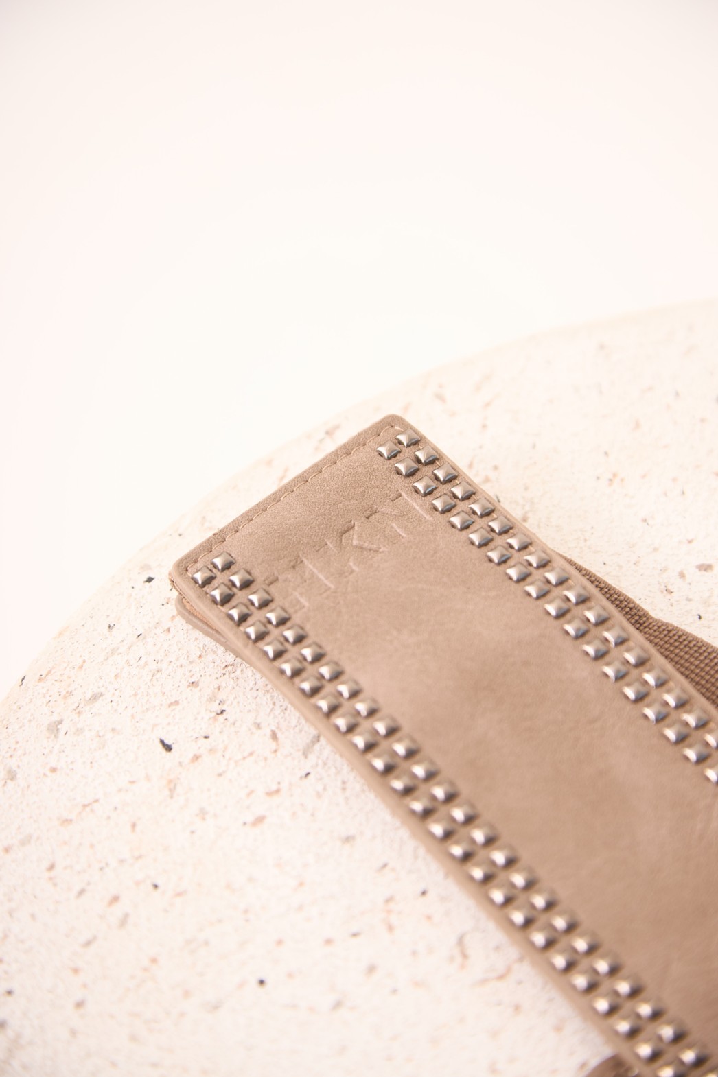 STUDDED ASYMMETRICAL BELT