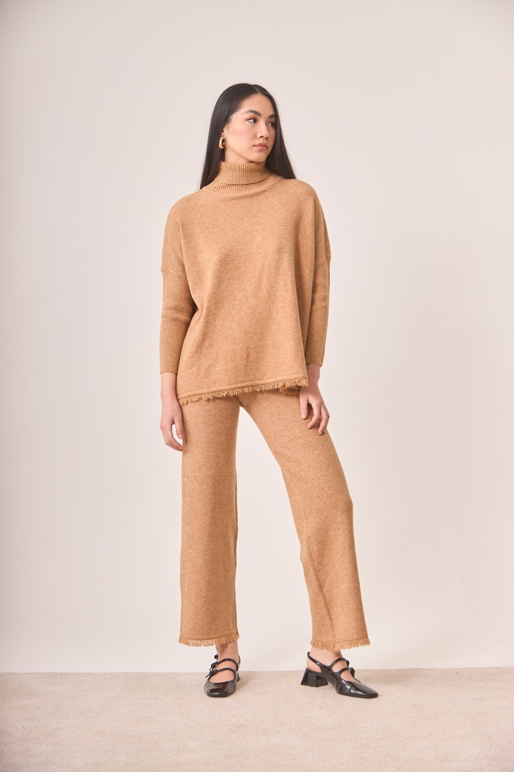 TURTLENECK JERSEY WITH FRINGE AT THE BOTTOM OF THE HEM 1